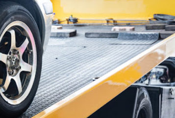 Golden Touch Auto Body offers towing roadside assistance